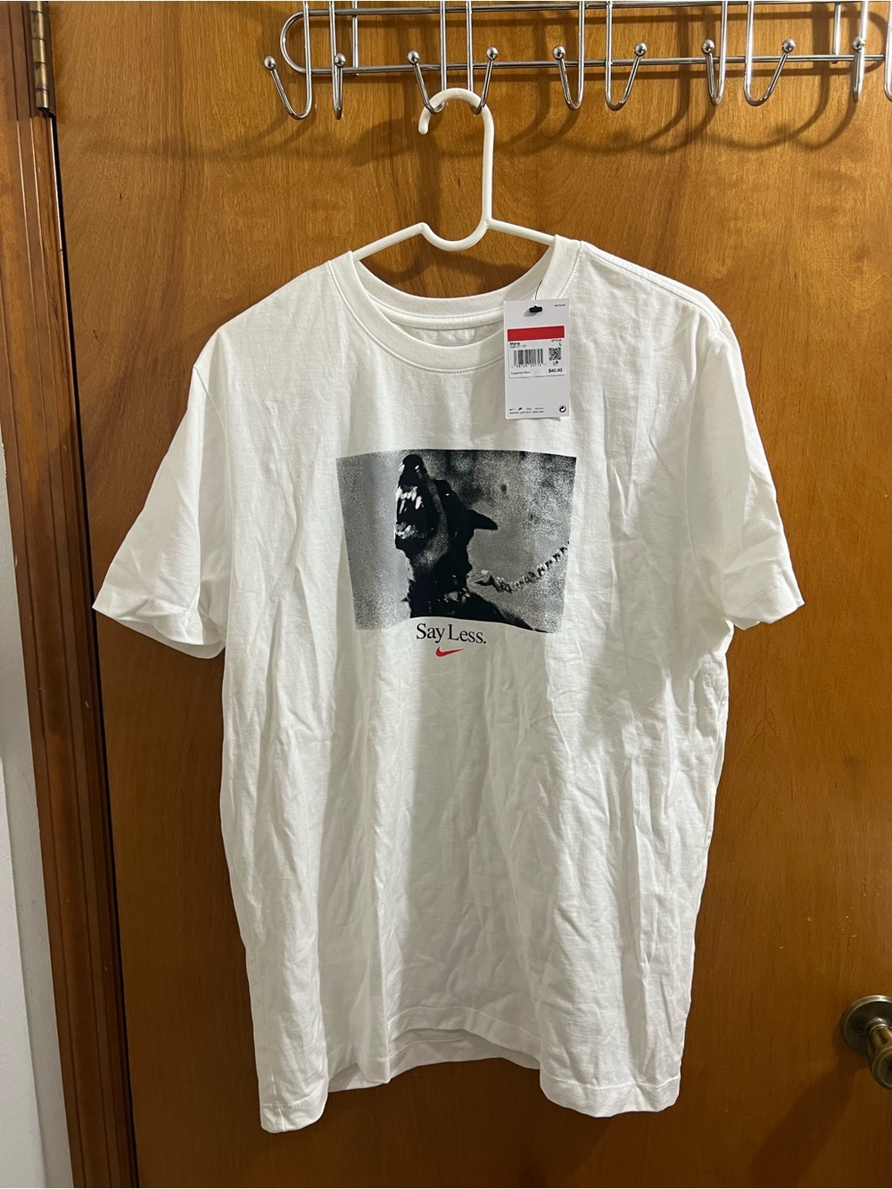 Nike White Short-Sleeve Graphic Tee with Black Photo Print and Red Swoosh